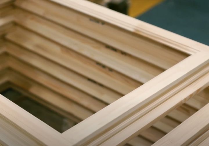 a pile of wooden frames